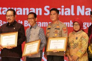 Kapolres Lampung Selatan AKBP Edwin SH. S.I.K.M.S.I Terima Penghargaan dari Mentri Sosial